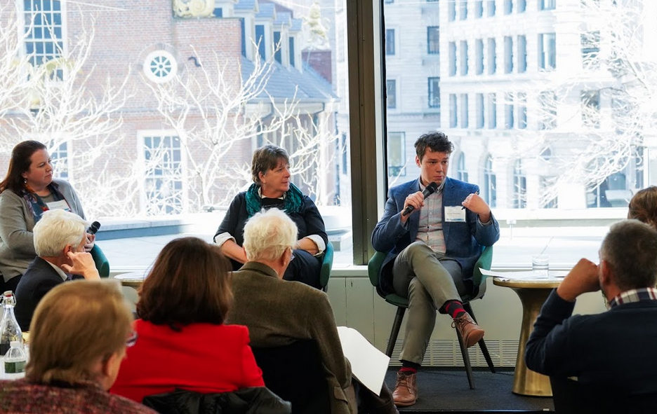 /><span>Left to right: Jessica Atwood, Economic Development Program Manager, Franklin Regional Council of Governments; MJ Adams, Director of Community & Economic Development, City of Greenfield; and Walter Ramsey, Town Planner & Conservation Agent, Town of Montague share an overview of their Academy experience at the Massachusetts Opportunity Zones Convening in November 2019.</span></p>
<p>Together, the City of Greenfield and Town of Montague in Massachusetts’ Pioneer Valley are home to three Opportunity Zones. The history of collaboration between the two communities, as well as their demonstrated commitment to equitable and sustainable community development, were among a handful of reasons why the two were selected to participate in the first-ever Massachusetts Opportunity Zones Academy.</p>
<p>The two communities set out to better understand how to attract more market-rate housing and mixed-use development to their respective downtowns. Smart Growth America conducted a series of quantitative analyses and in-person workshops on leveraging Opportunity Zones to help achieve these smart growth development goals.</p>
<p>SGA conducted hot spot and pro forma analyses for development sites and shovel-ready projects in Greenfield and Montague’s three Opportunity Zones. These analyses were intended to help the two communities visualize the type of equitable Opportunity Zone development that would be most feasible in their downtowns. The hot spot analysis calculated the return on potential real estate projects in the three Opportunity Zones, based on existing land value, and also weighed costs and benefits of downtown and downtown adjacent development. The hot spot analyses concluded that highest real estate value and potential was located within Greenfield and Montague’s respective downtown Opportunity Zones, with an average value of $716,000 per acre within Greenfield’s hot spots and $676,000 per acre within Montague’s hot spots.</p>
<p>The two communities then selected four shovel-ready Opportunity Zone projects, one in Montague and three in Greenfield, to assess through the pro forma analysis. SGA’s findings concluded that two of the assessed project sites would pencil with help from the Opportunity Zone incentive. The two projects were a mixed-use development for a vacant lot in downtown Montague, known as 38 Avenue A, and a mixed-use rehab of Greenfield’s historic Garden Cinema.</p>
<p><img loading=