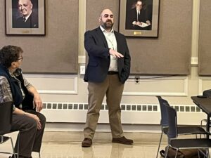 Commissioner Garrett Eucalitto of Connecticut Department of Transportation standing to give remarks