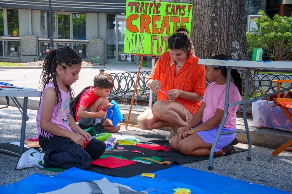A group of children engaging in activities under adult supervision.